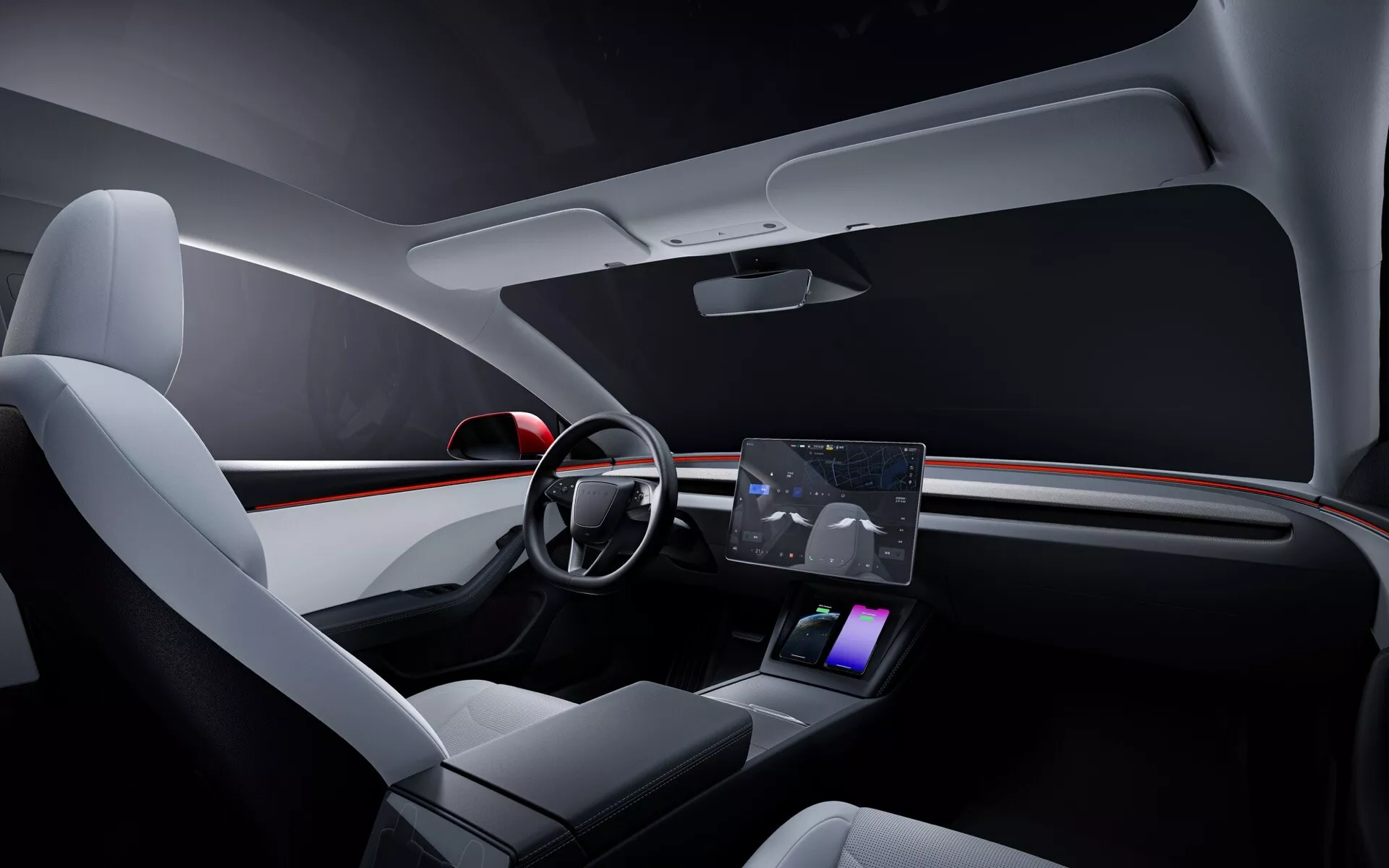 Intérieur du Tesla Model 3 2023 (1ère Génération - Facelift) montrant la cabine avant avec un design de tableau de bord moderne intégrant un éclairage d'ambiance avec accent rouge, un volant simplifié à deux branches avec commandes intégrées, un écran tactile central proéminent pour la navigation et les médias, une interface minimaliste pour le contrôle climatique, des sièges avant avec garniture premium, une console centrale élégante avec un pad de chargement sans fil, un panneau de porte conducteur minimaliste avec commandes sensitives, et un éclairage ambiant intérieur amélioré pour une sensation de luxe axée sur la technologie.