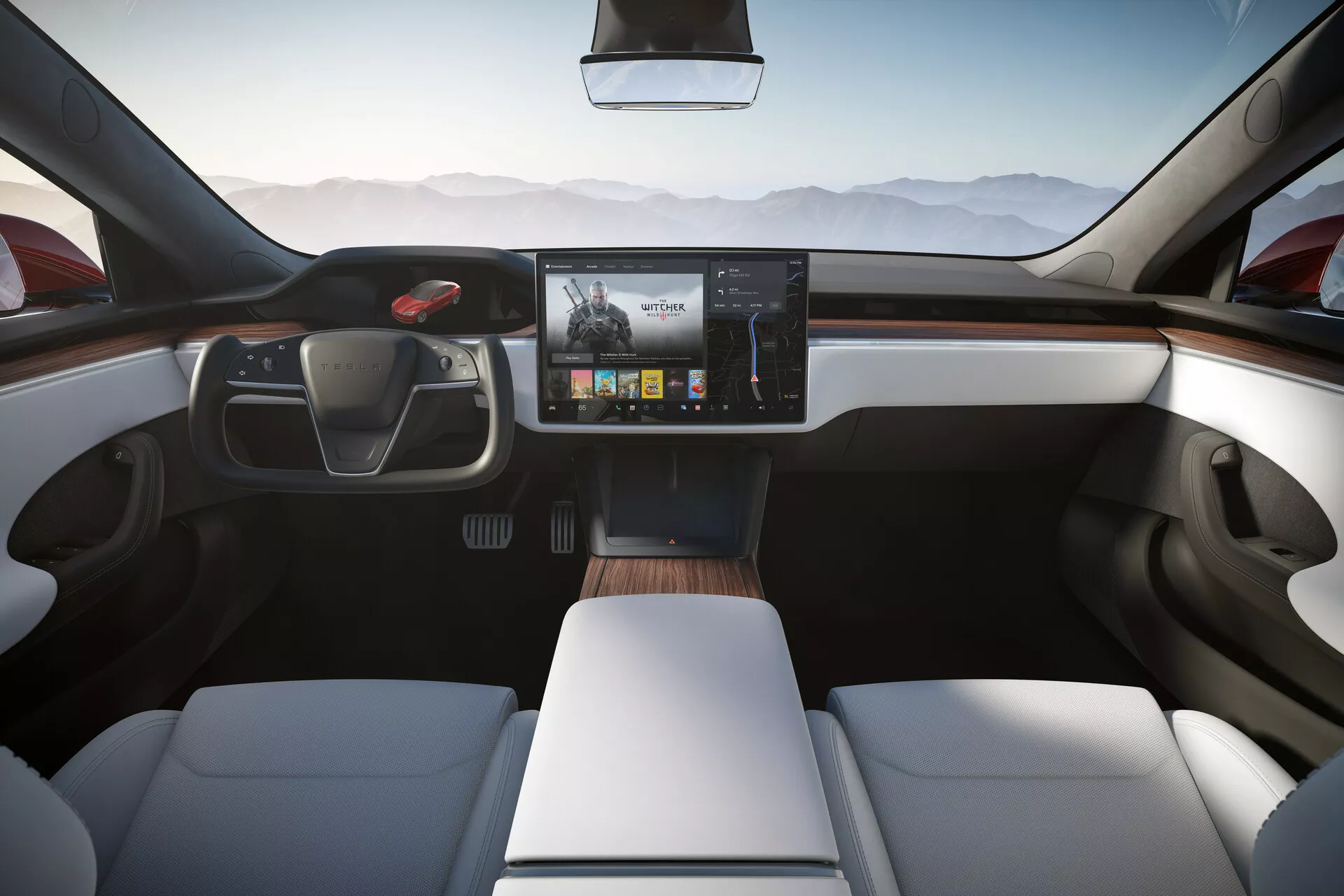 Vue de l'intérieur d'une Tesla Model S 2016 (restylage génération 1) depuis la banquette arrière, mettant en avant un tableau de bord moderne et épuré avec un écran tactile central, un volant non conventionnel, des sièges avant blancs au design contemporain et une finition en bois. Le design minimaliste suggère des technologies avancées avec des capacités autonomes possibles, accentuées par la lumière naturelle entrant par les grandes fenêtres.